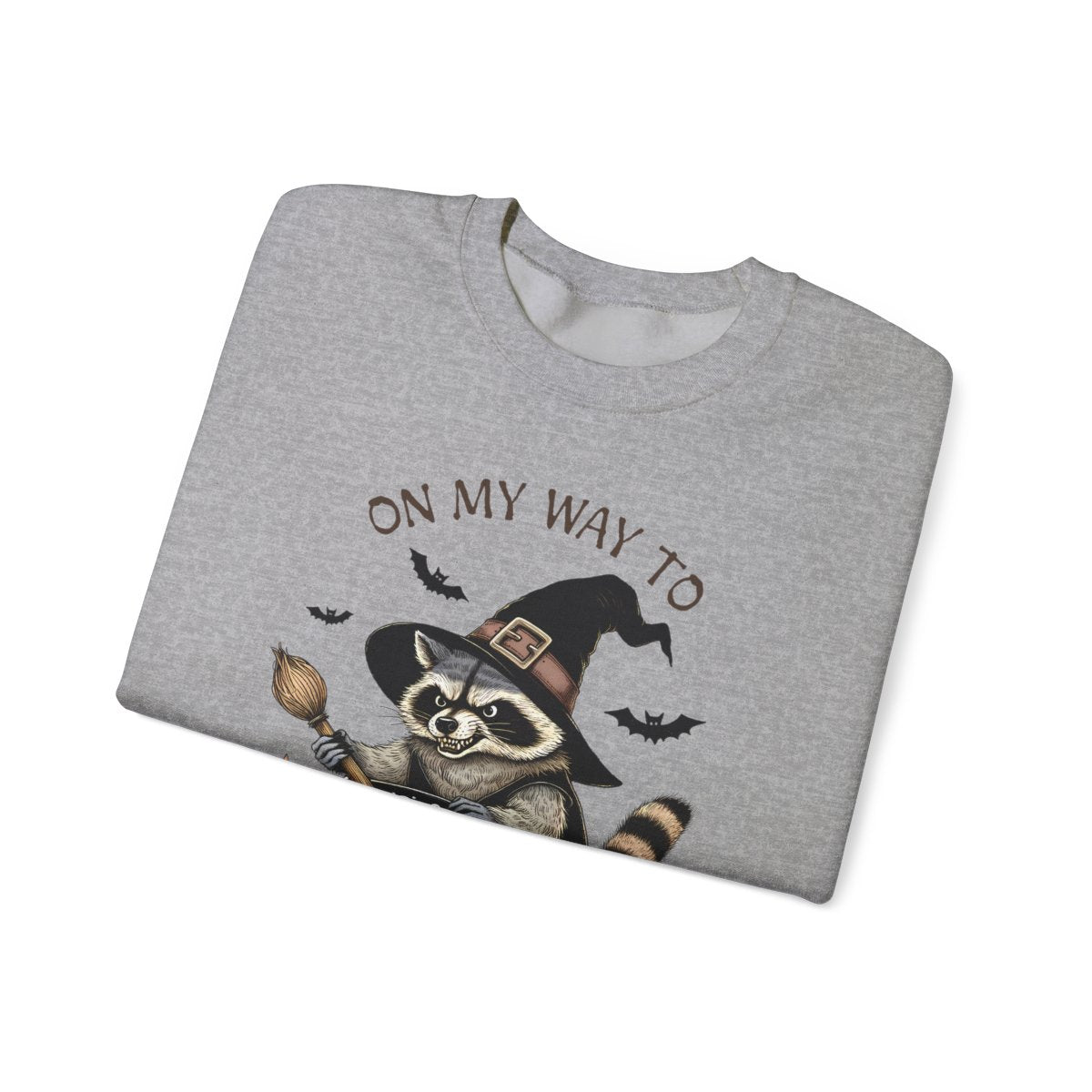 unisex halloween sweatshirt showing raccoon witch front print detail