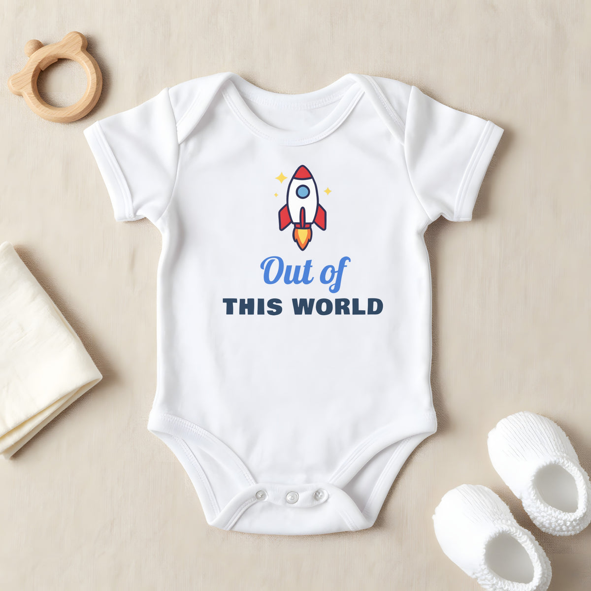 Out Of This World baby grow laid flat