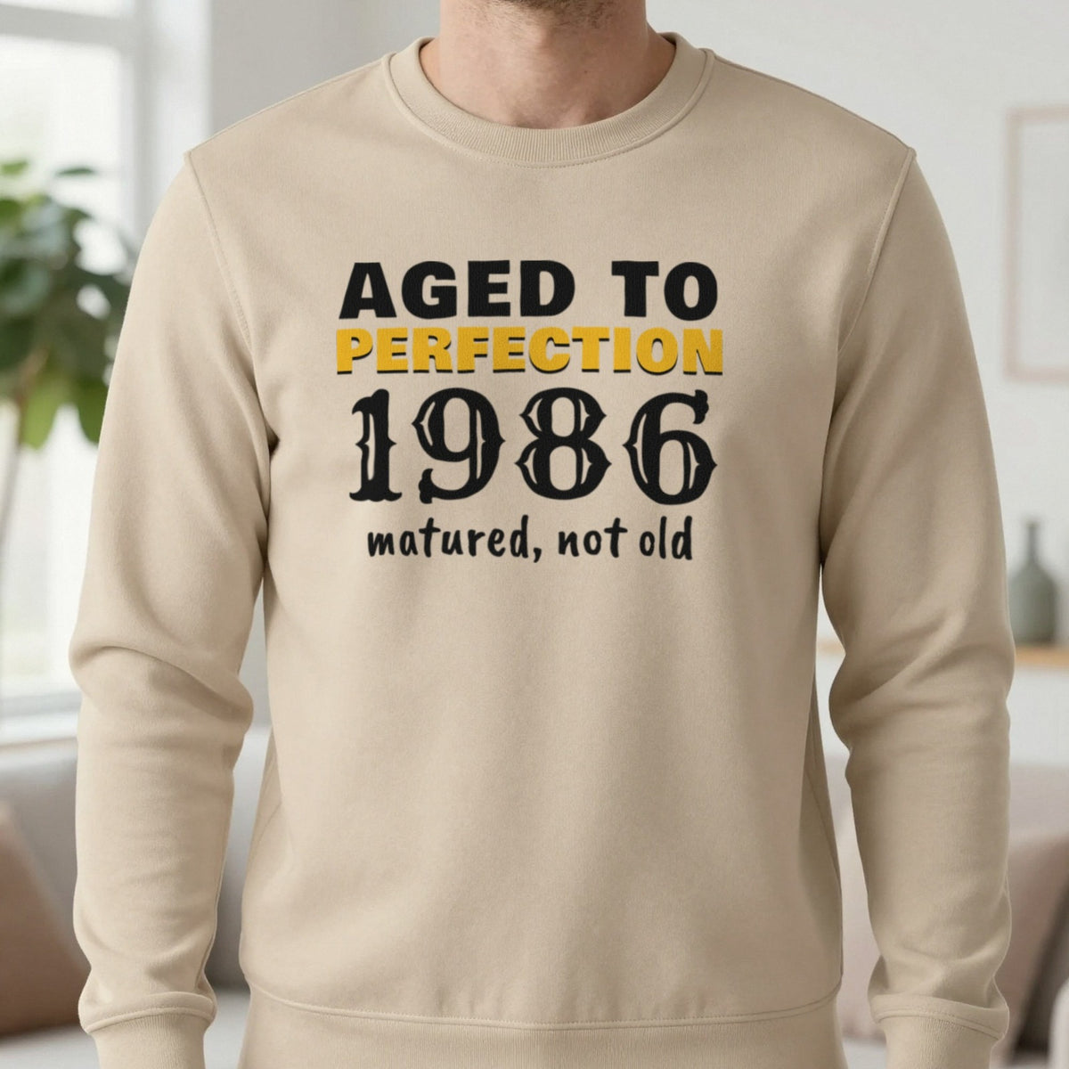 Personalised Aged To Perfection Year T-Shirt Sweatshirt in Sand, worn, our photo