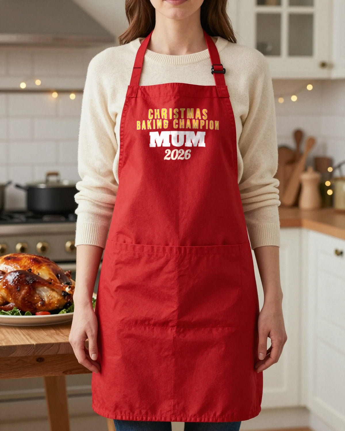 Christmas Baking Champion & In Training grown-up apron, worn