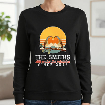 Personalised Couples Mistletoe Christmas Jumper & T-Shirt Sweatshirt in Black, worn, our photo