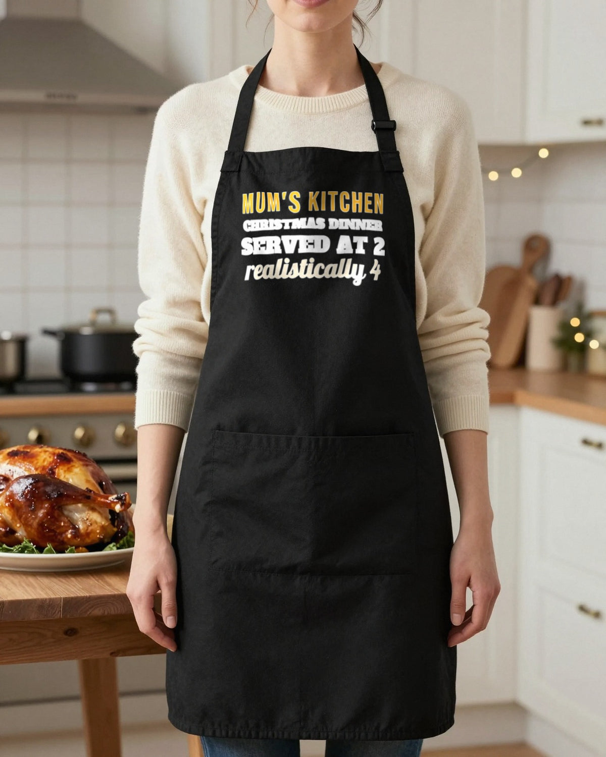 Name's Kitchen Christmas Dinner Served At 2 Christmas apron in Black, worn, our photo