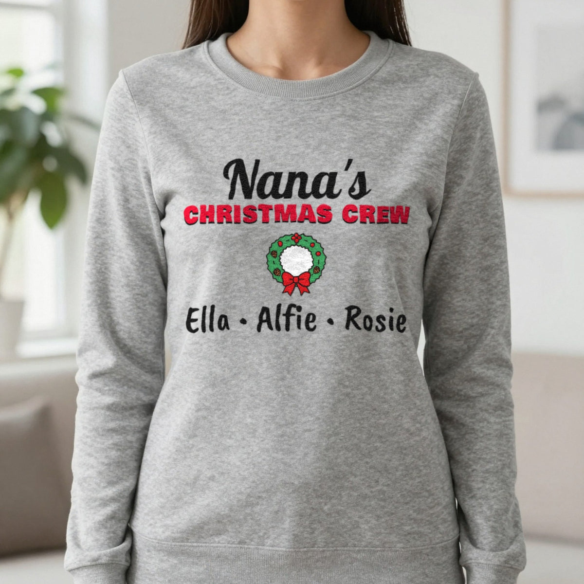 Personalised Nana's Christmas Crew Jumper & T-Shirt Sweatshirt in Sport Grey, worn, our photo