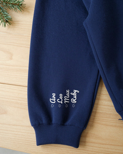 Close-up of grandkids names embroidered on the sleeve above the cuff