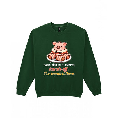 Personalised Pigs In Blankets Christmas Jumper & T-Shirt laid flat