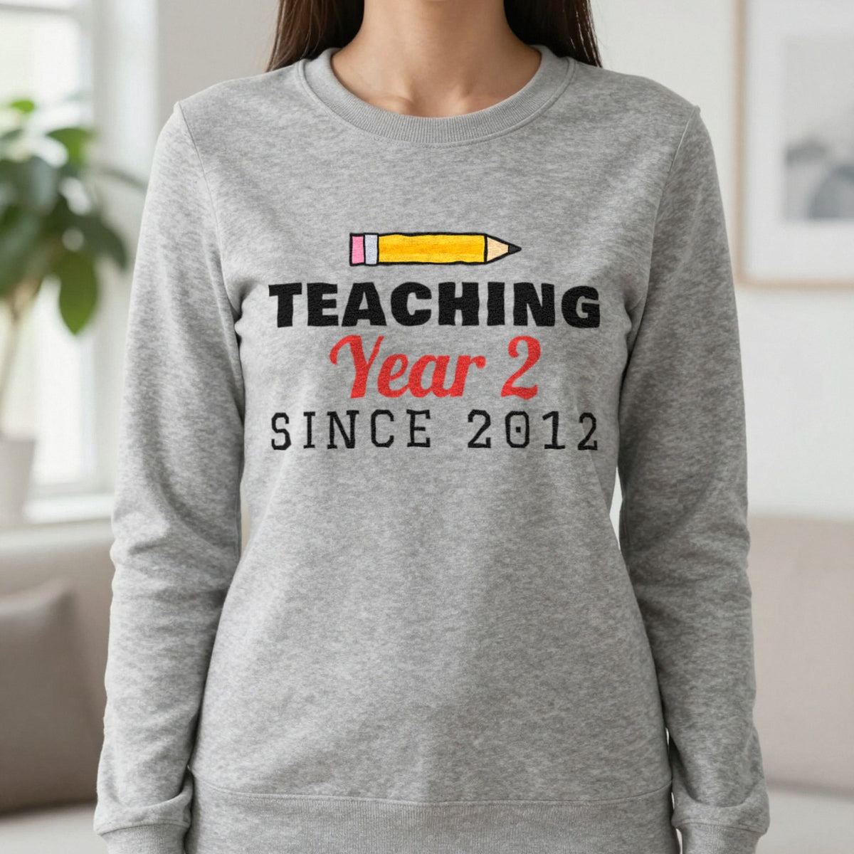 Personalised Teaching Since T-Shirt & Sweatshirt Sweatshirt in Sport Grey, worn, our photo