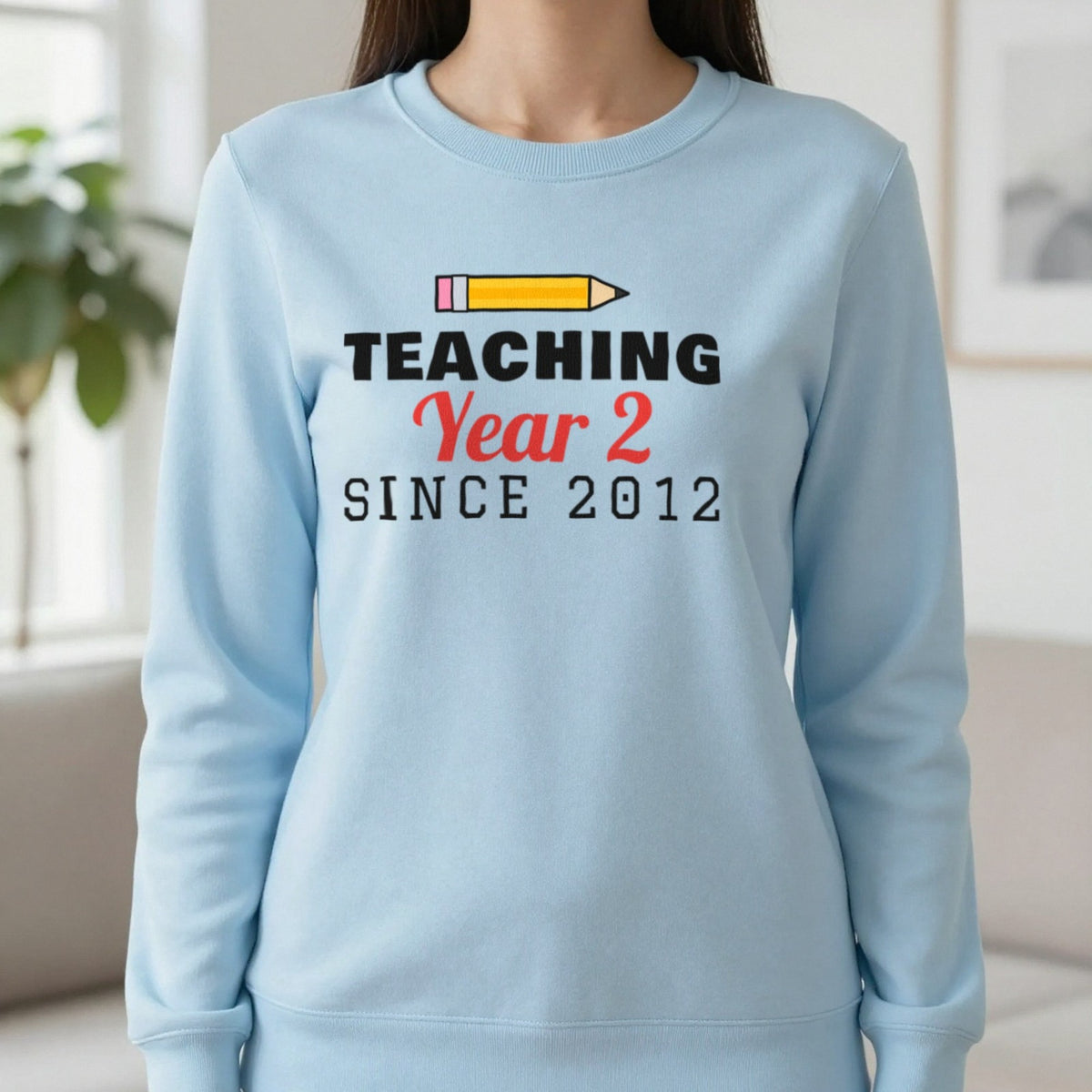 Personalised Teaching Since T-Shirt & Sweatshirt Sweatshirt in Light Blue, worn, our photo