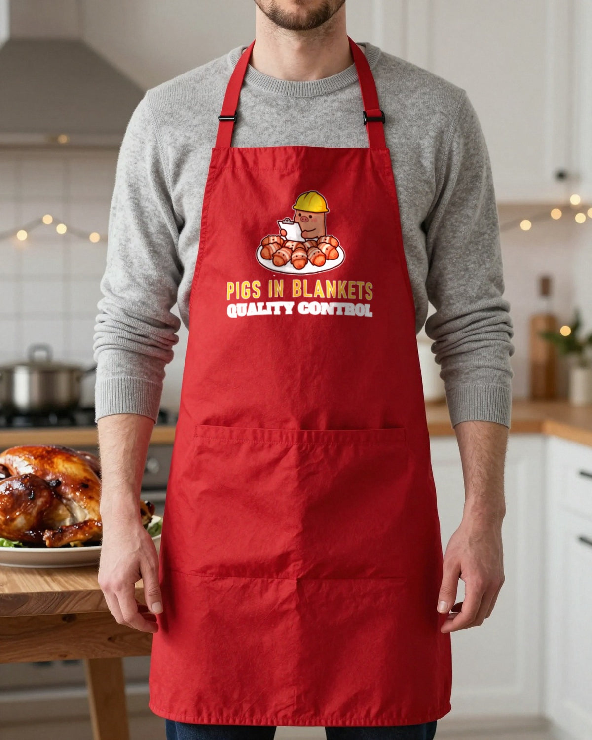 Pigs In Blankets Quality Control Christmas apron in Red, worn, our photo
