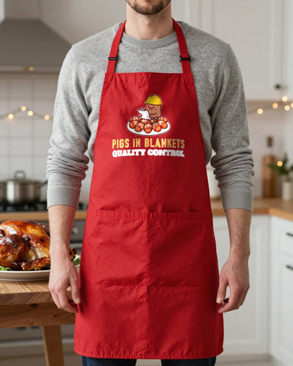 Pigs In Blankets Quality Control Christmas apron in Red, worn, our photo