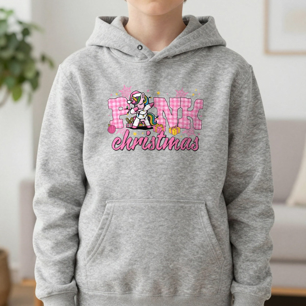 Pink Christmas Unicorn Kids Hoodie in Sport Grey, worn, our photo