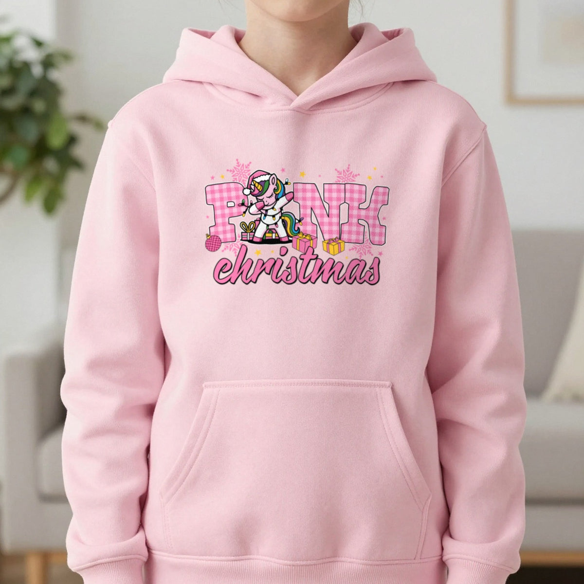 Pink Christmas Unicorn Kids Hoodie in Light Pink, worn, our photo