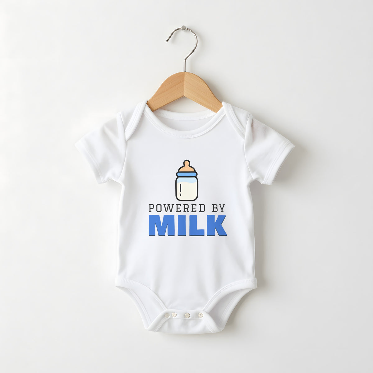 Powered By Milk white baby grow on a hanger
