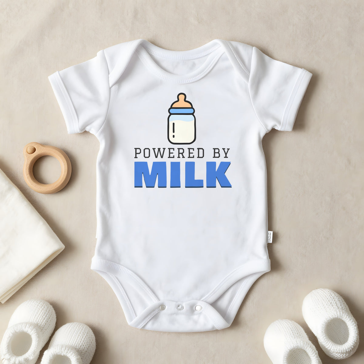 Powered By Milk baby grow laid flat