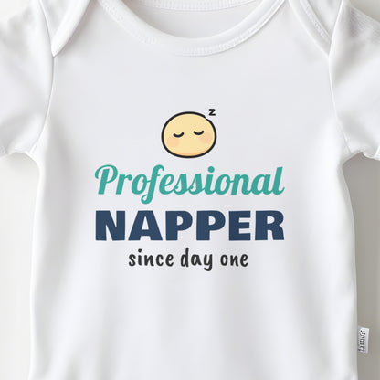 Professional Napper Since Day One baby grow print close-up