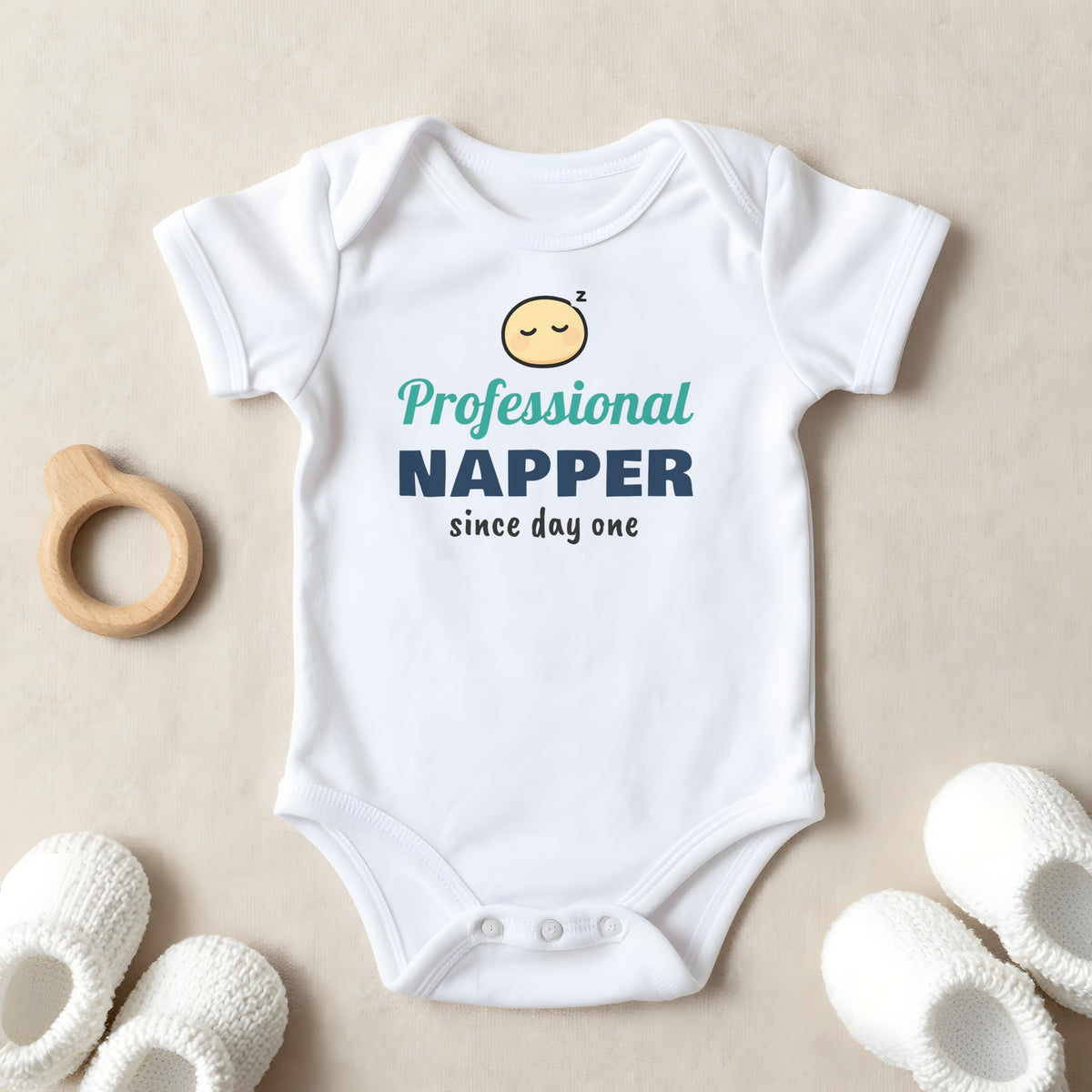 Professional Napper Since Day One baby grow laid flat