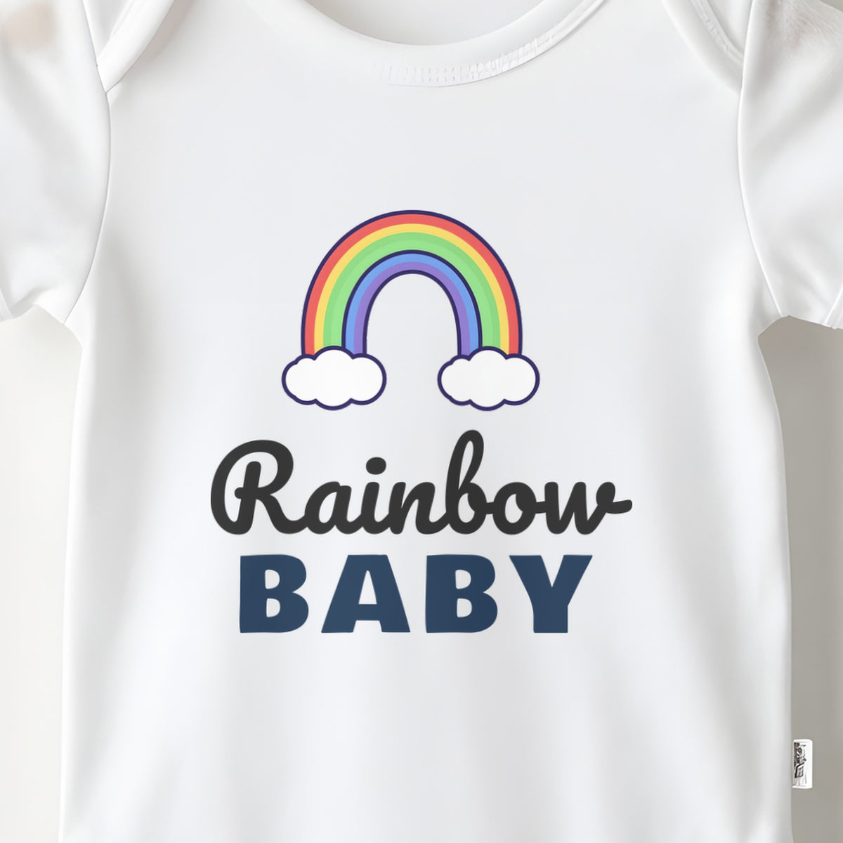 Rainbow Baby baby grow print close-up