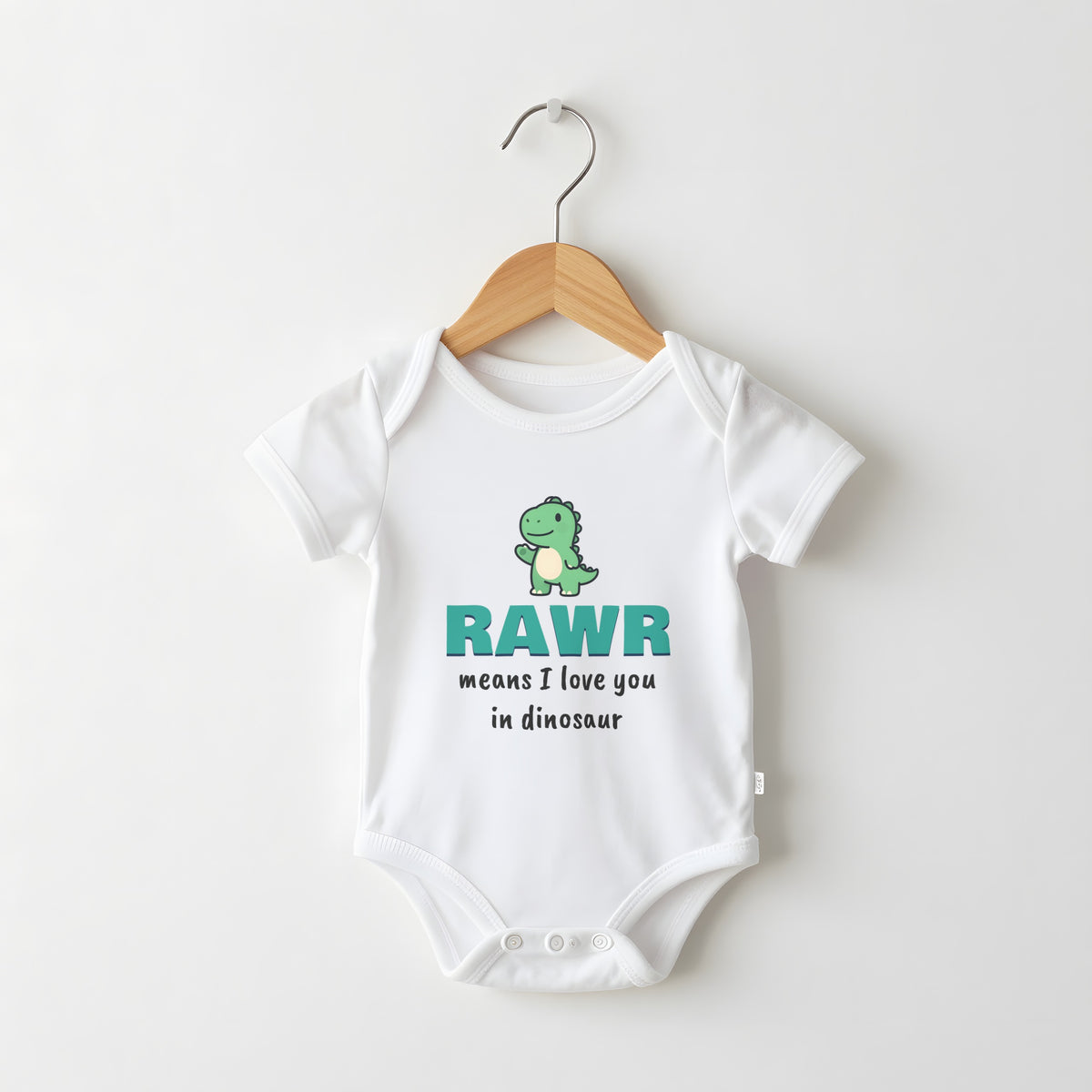 Rawr Means I Love You In Dinosaur white baby grow on a hanger