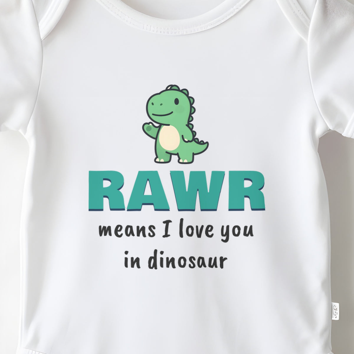 Rawr Means I Love You In Dinosaur baby grow print close-up