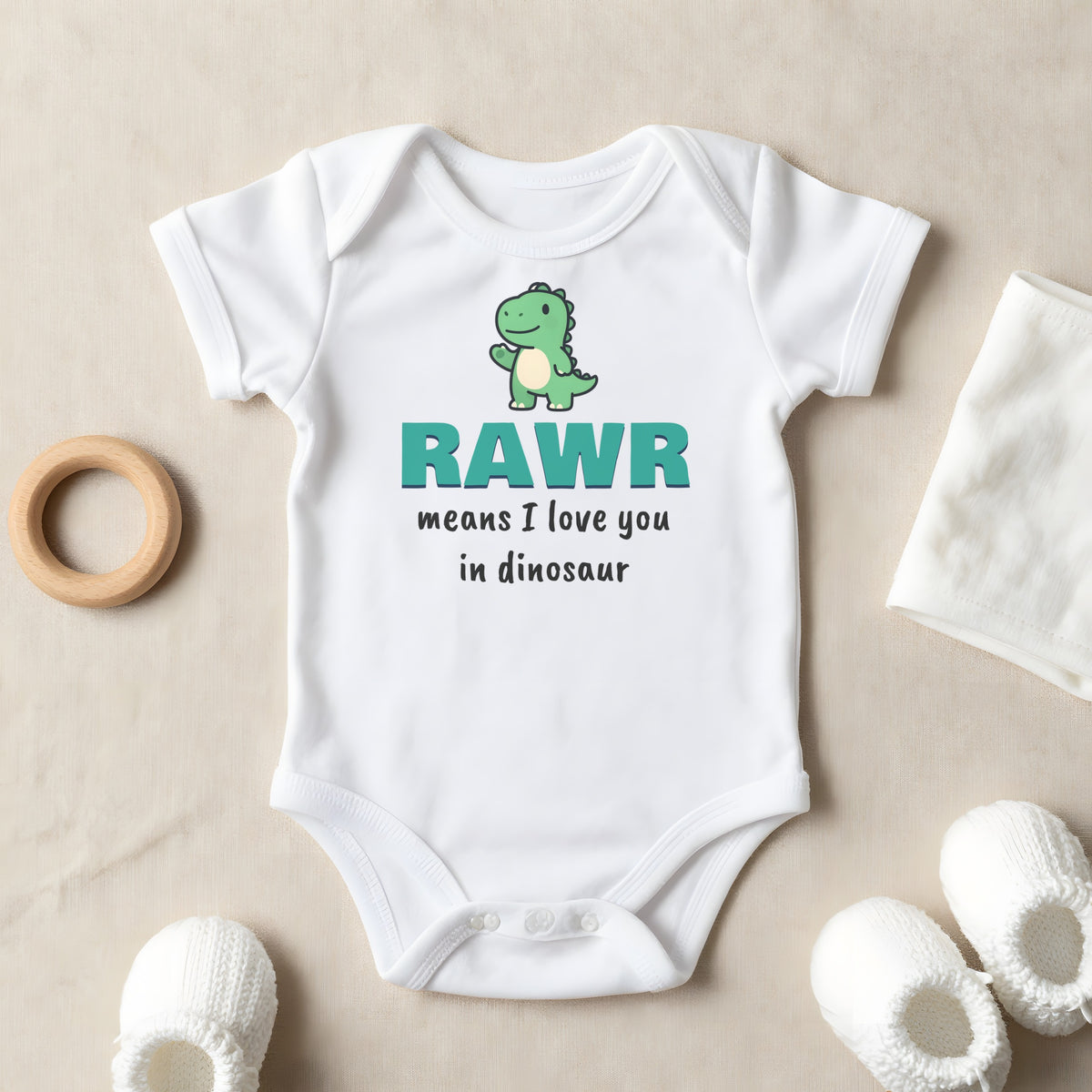 Rawr Means I Love You In Dinosaur baby grow laid flat