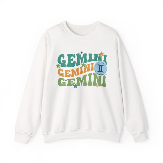 light pink sweatshirt with retro gemini zodiac design and vintage typography