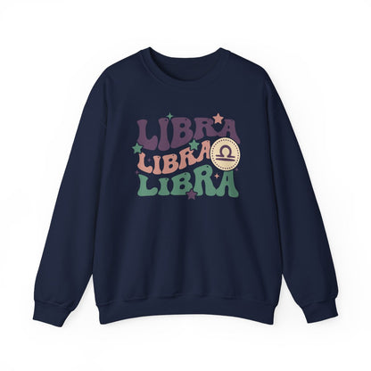 white sweatshirt displaying retro libra design with soft pastel zodiac elements