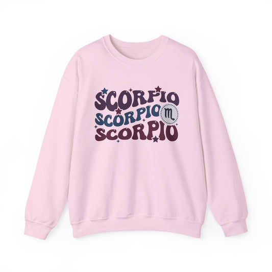 light pink sweatshirt with retro scorpio zodiac groovy typography and celestial stars design