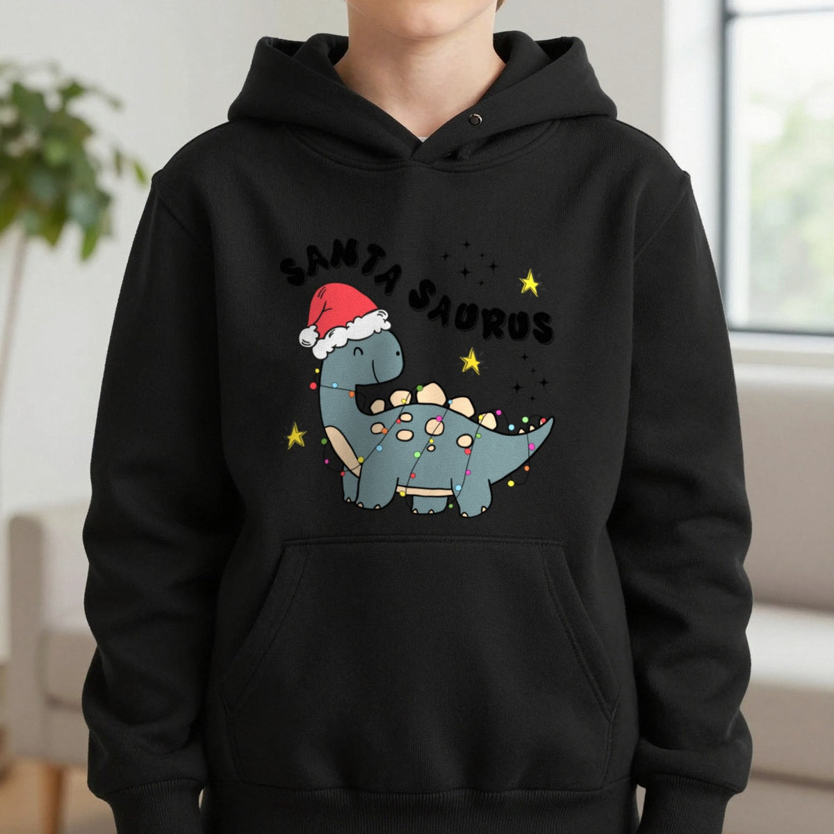 Santasaurus Christmas Kids Hoodie in Black, worn, our photo