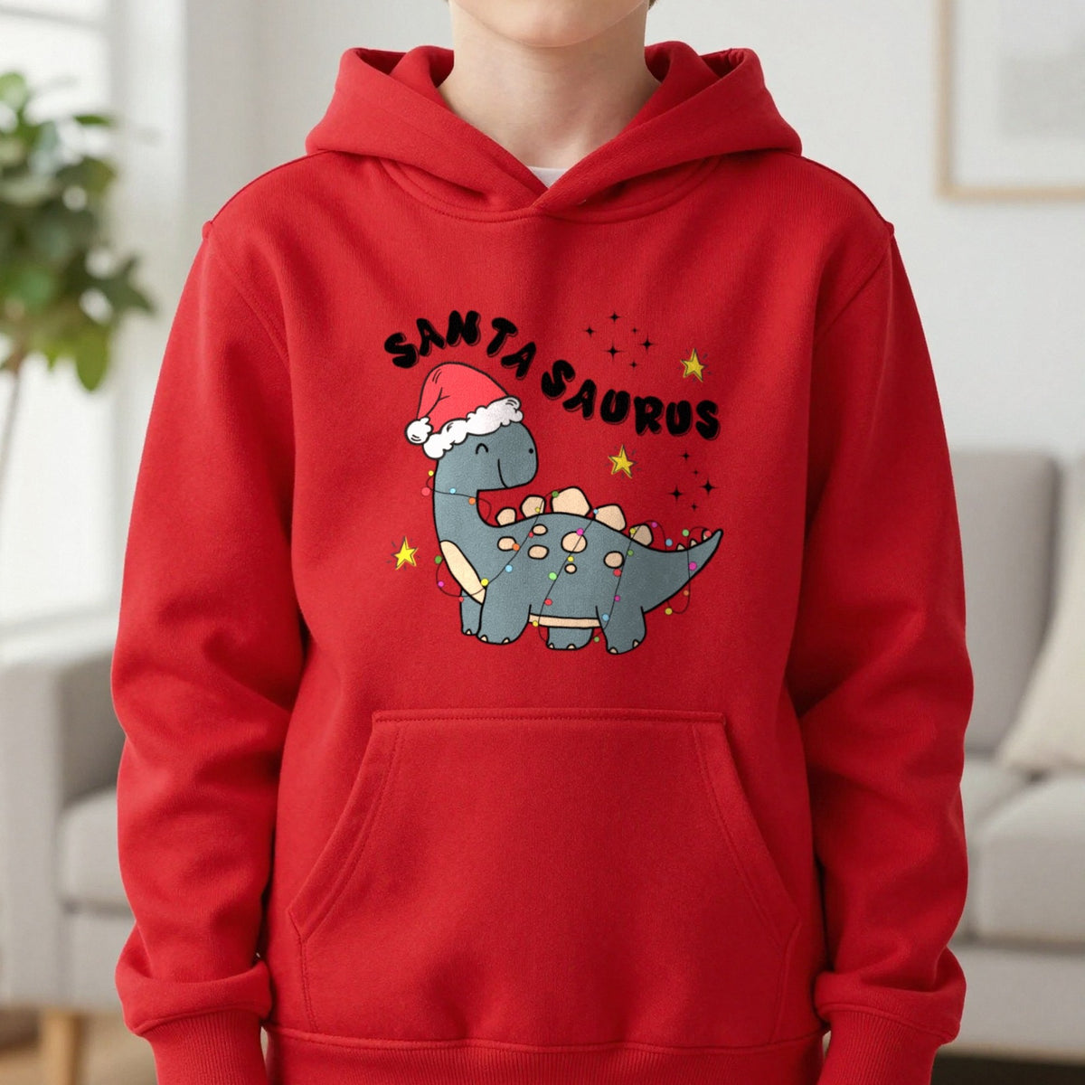 Santasaurus Christmas Kids Hoodie in Red, worn, our photo