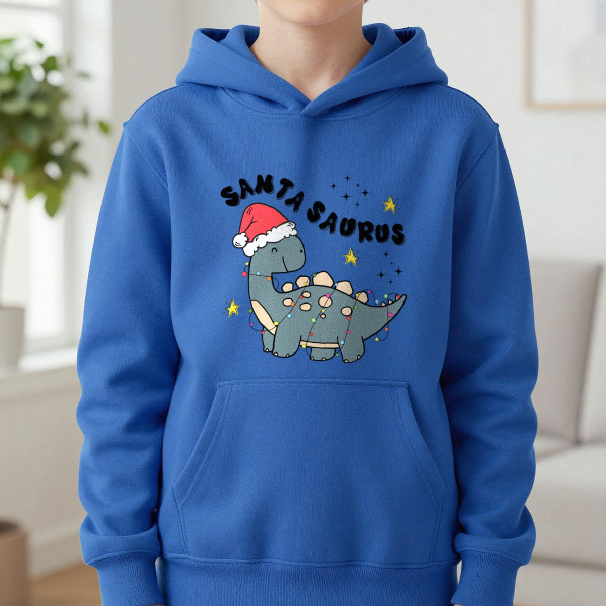 Santasaurus Christmas Kids Hoodie in Royal, worn, our photo