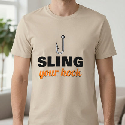 Sling Your Hook Funny Fishing T-Shirt & Sweatshirt in Sand (T-Shirt), worn, our photo