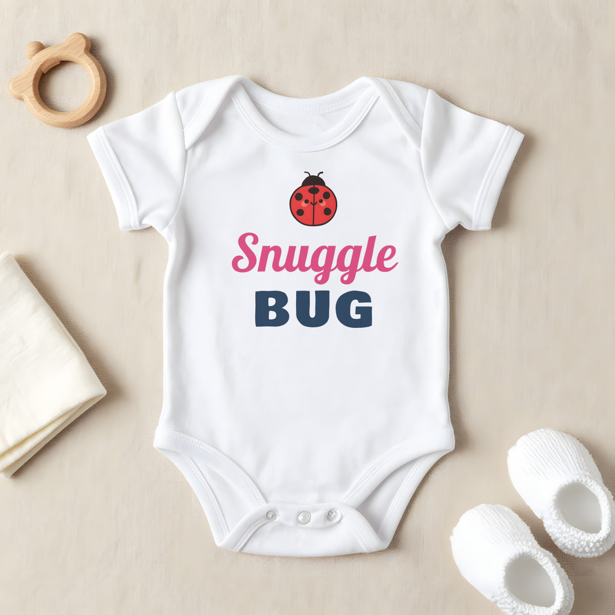 Snuggle Bug baby grow laid flat
