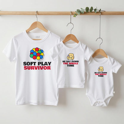 Soft Play Survivor & He Sat Down The Whole Time matching set grown-up tee, kids tee and baby grow on hangers