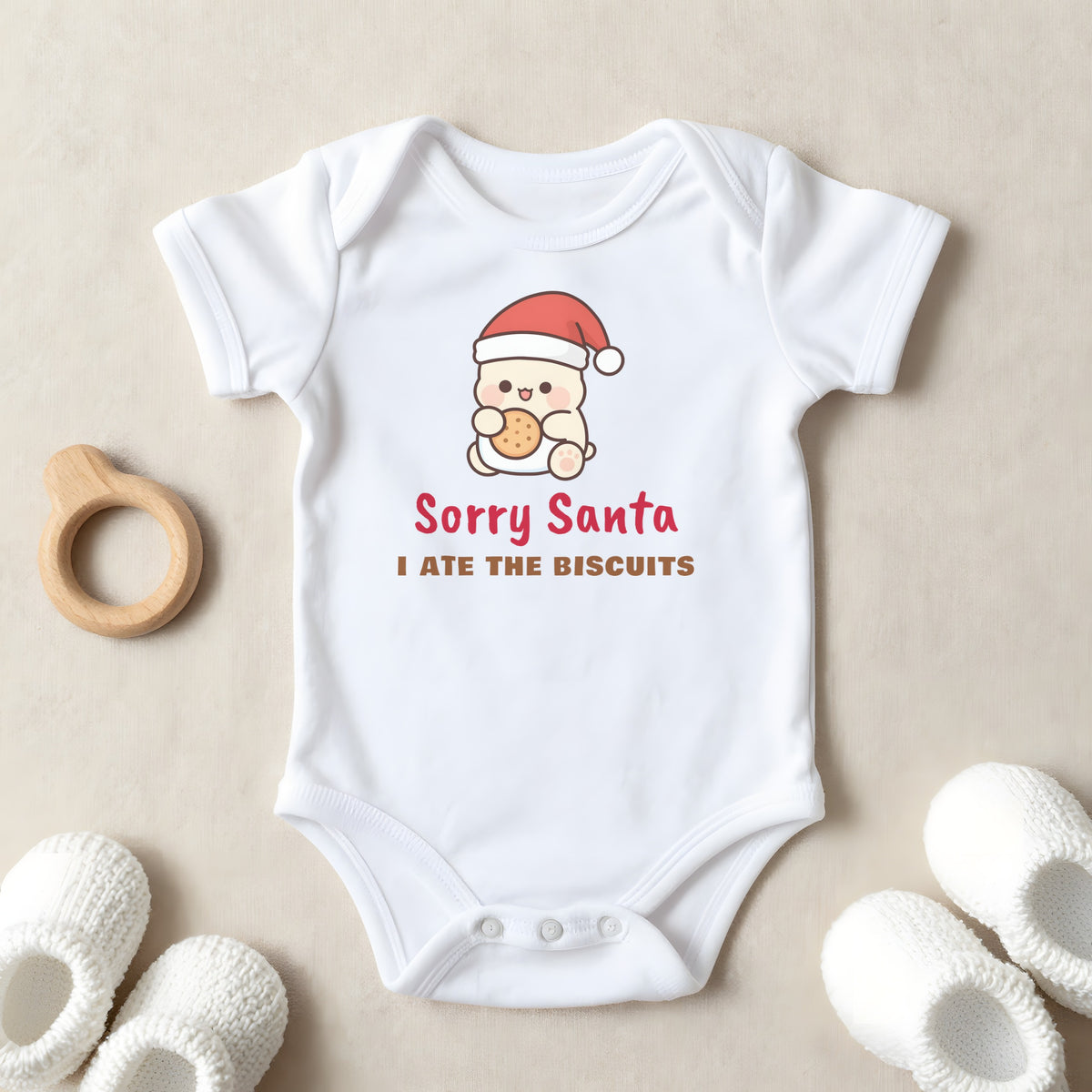 Sorry Santa I Ate The Biscuits baby grow laid flat