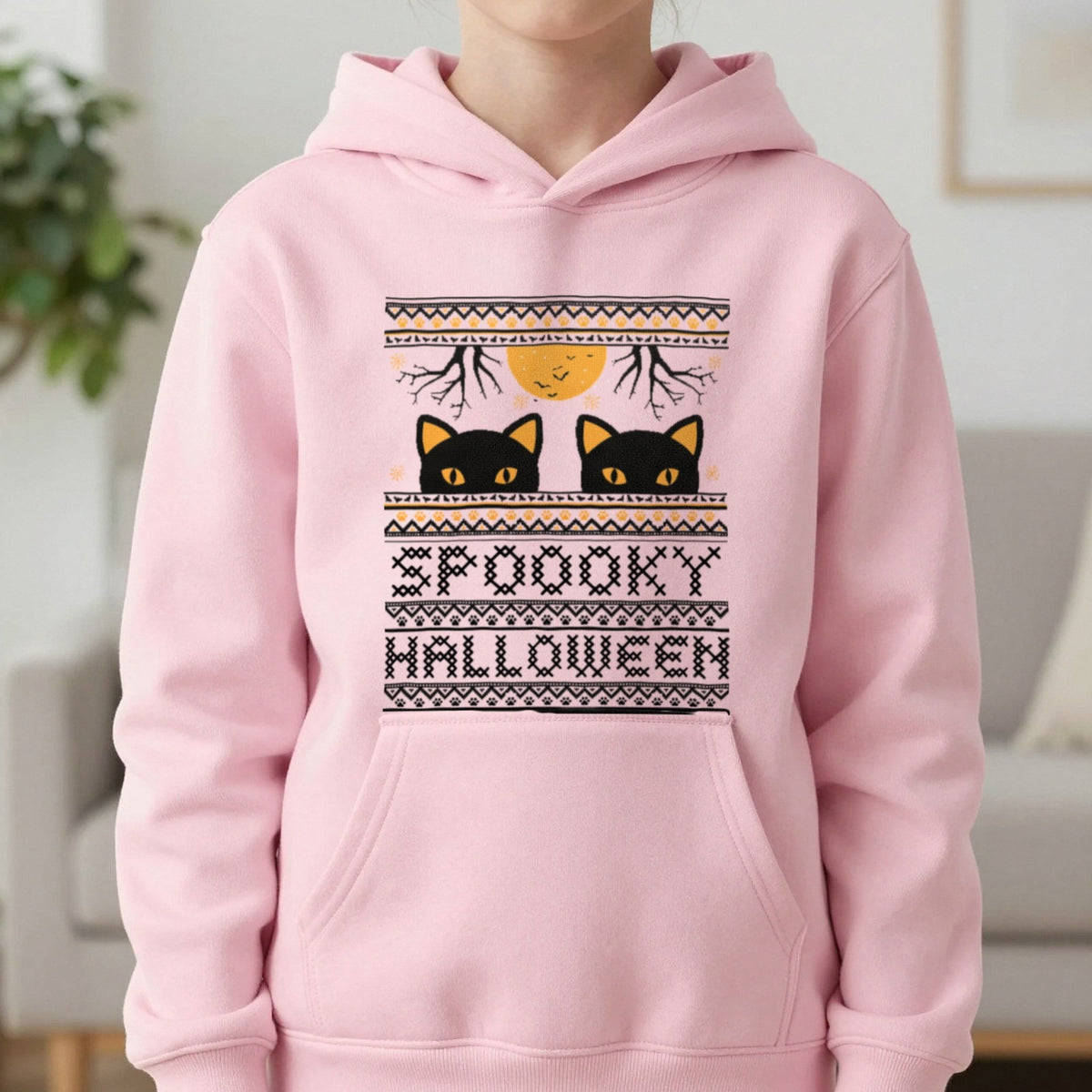 Spooky Halloween Black Cat Kids Hoodie in Light Pink, worn, our photo