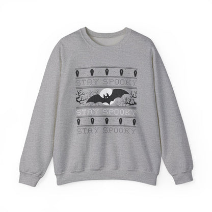 red sweatshirt with stay spooky bat and moon design