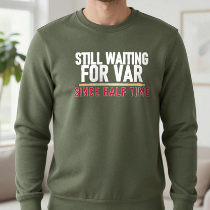 Still Waiting For VAR Since Half Time Funny Football T-Shirt & Sweatshirt in Military Green, worn, our photo