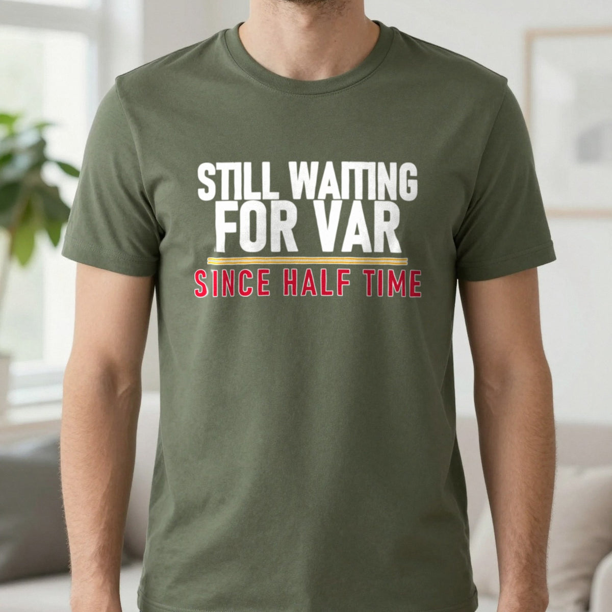 Still Waiting For VAR Since Half Time Funny Football T-Shirt & Sweatshirt in Military Green, worn, our photo