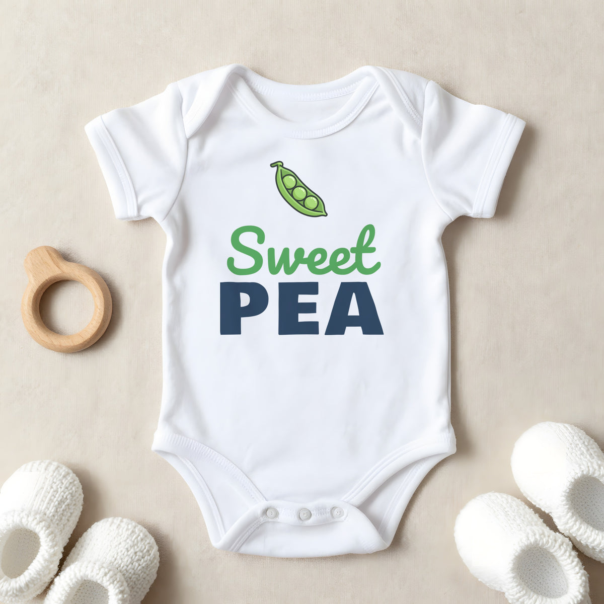 Sweet Pea baby grow laid flat