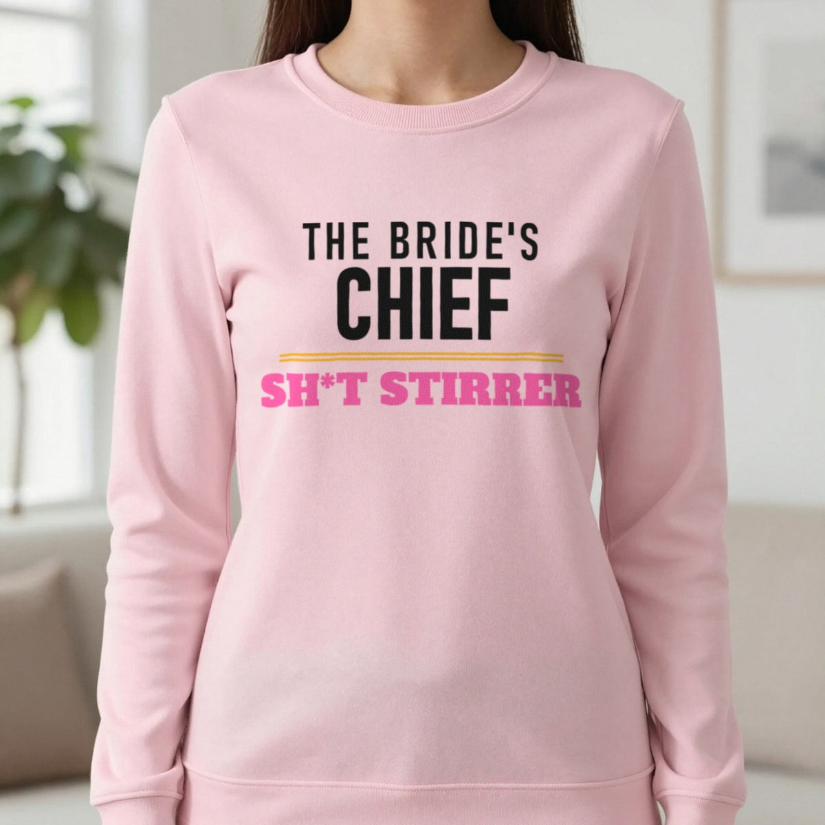 The Bride's Chief Sh*t Stirrer Hen Do T-Shirt & Sweatshirt in Light Pink, worn, our photo