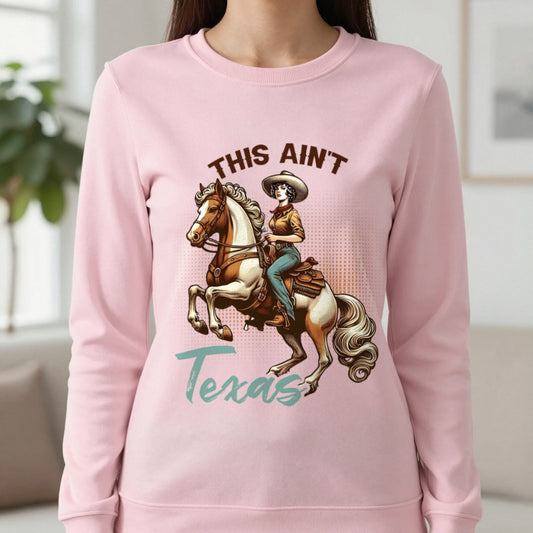 This Ain’t Texas Cowgirl Sweatshirt in Light Pink, worn, our photo