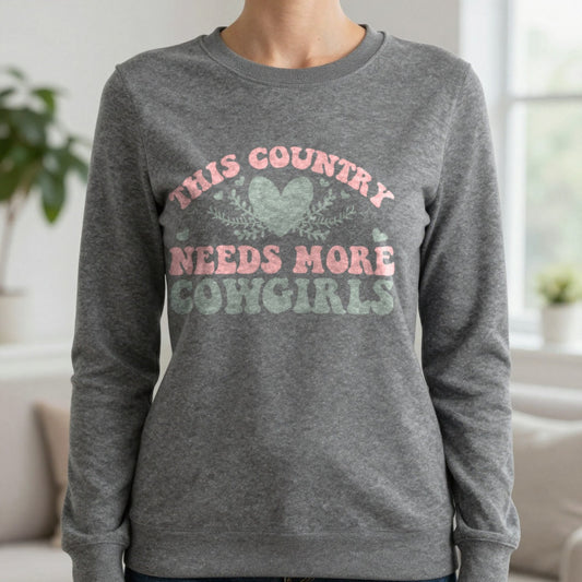 This Country Needs More Cowgirls Sweatshirt in Dark Heather, worn, our photo