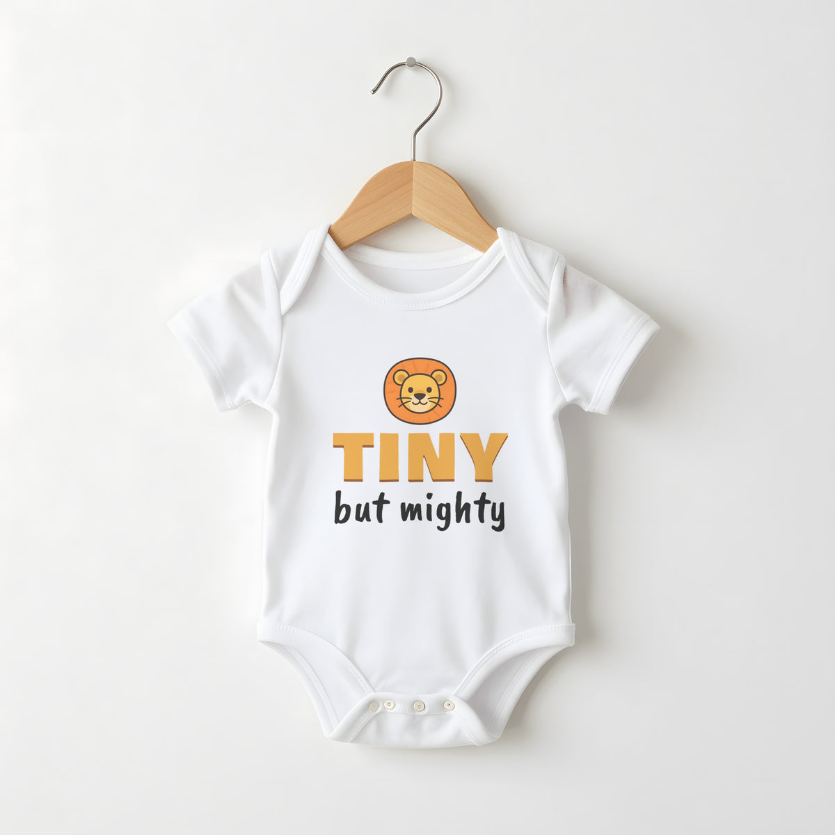 Tiny But Mighty white baby grow on a hanger