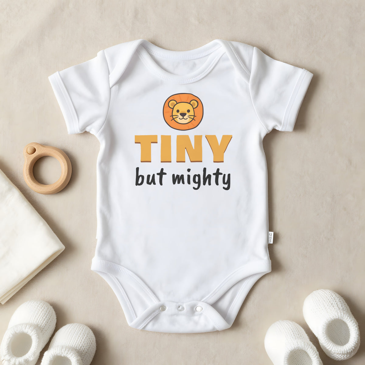 Tiny But Mighty baby grow laid flat