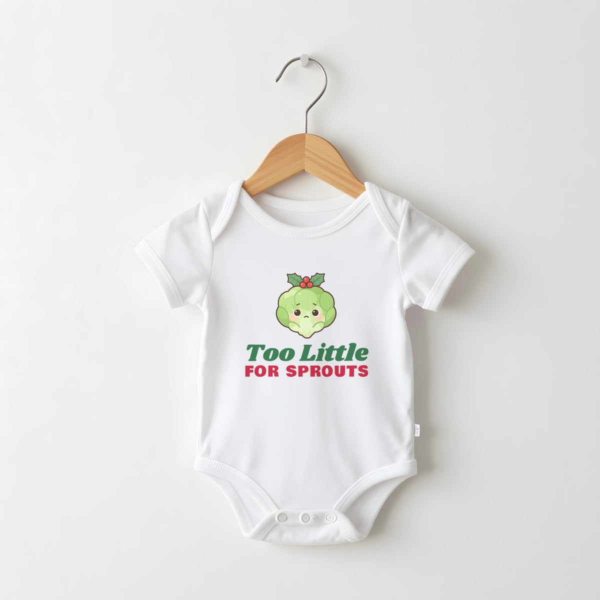 Too Little For Sprouts white baby grow on a hanger