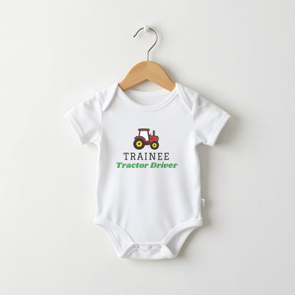 Trainee Tractor Driver white baby grow on a hanger