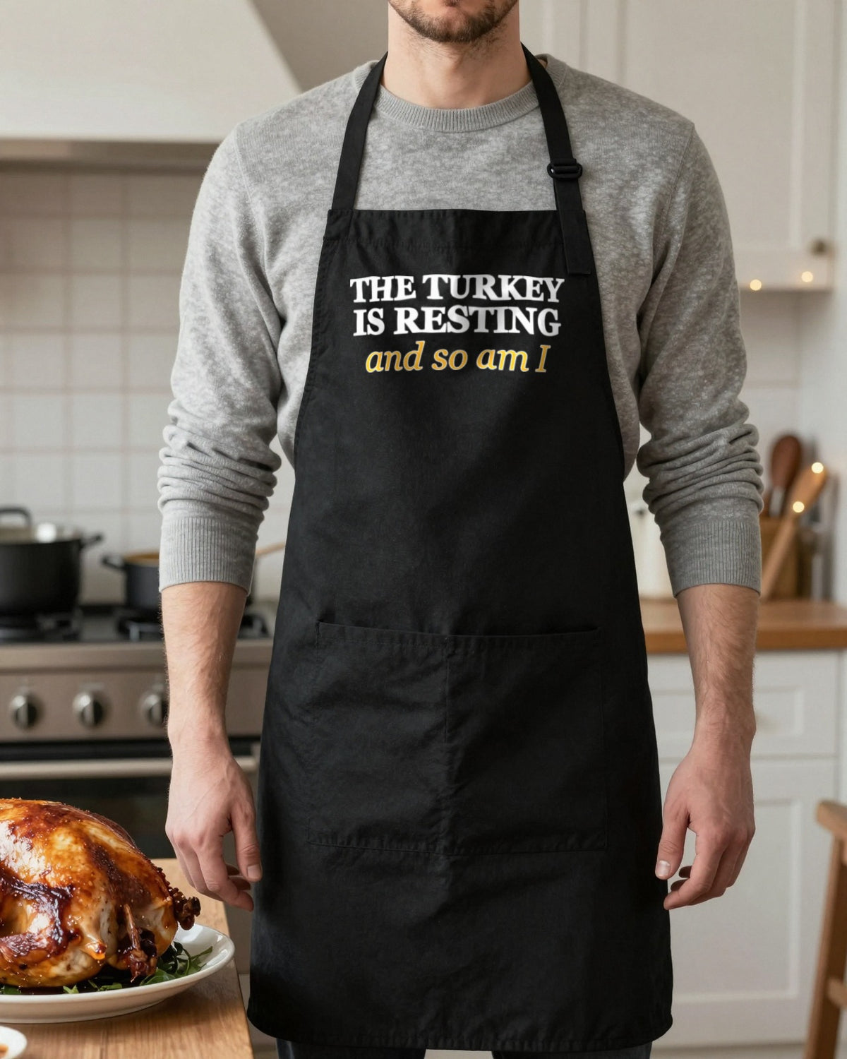 The Turkey Is Resting And So Am I Christmas apron in Black, worn, our photo