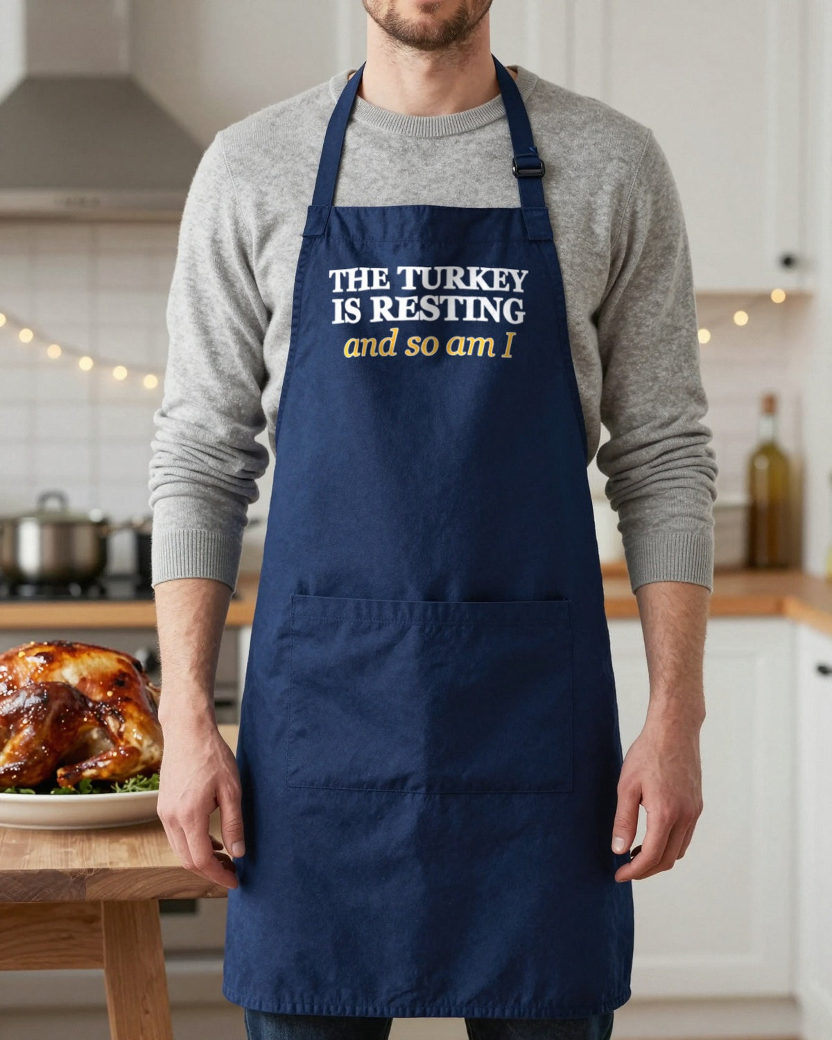 The Turkey Is Resting And So Am I Christmas apron in Navy, worn, our photo