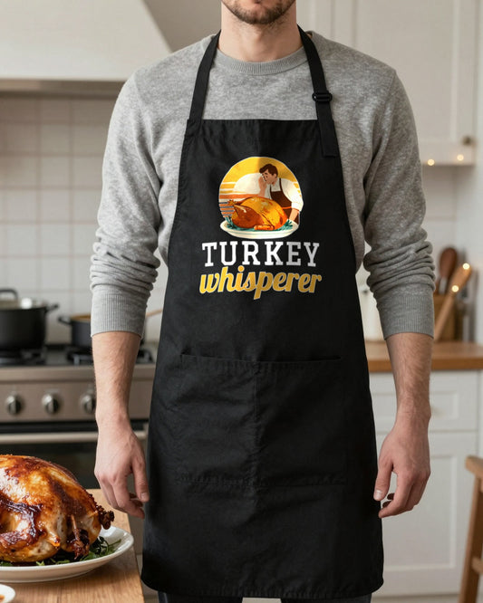 Turkey Whisperer Christmas apron in Black, worn, our photo