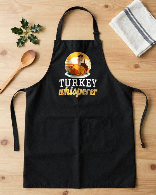 Turkey Whisperer Christmas apron laid flat
