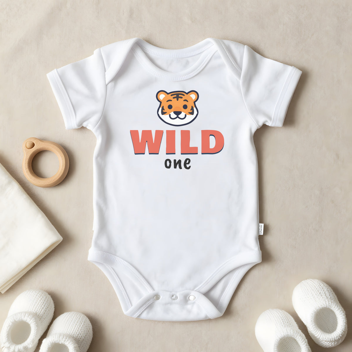 Wild One baby grow laid flat